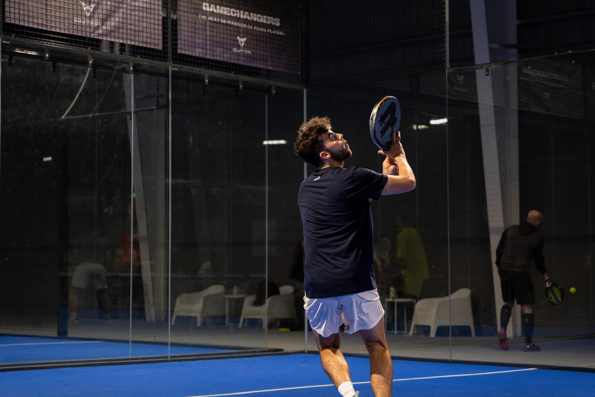 Players greeting each other on a padel court